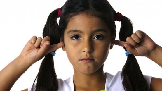 Little-girl-is-closing-her-ears-with-her-fingers-via-Shutterstock-615x345