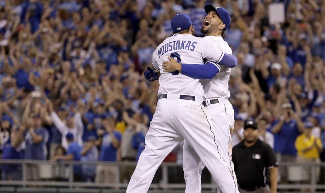 Kansas City Royals' Eric Hosmer, right, and Mike Moustakas celebrate after the Royals' baseball game against the Seattle Mariners on Thursday, Sept. 24, 2015, in Kansas City, Mo. The Royals won 10-4 and clinched the AL Central. (AP Photo/Charlie Riedel)